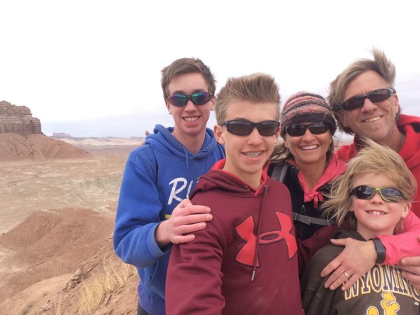 My #1 – my husband and sons – with me on top of a mountain we climbed SW Utah recently.