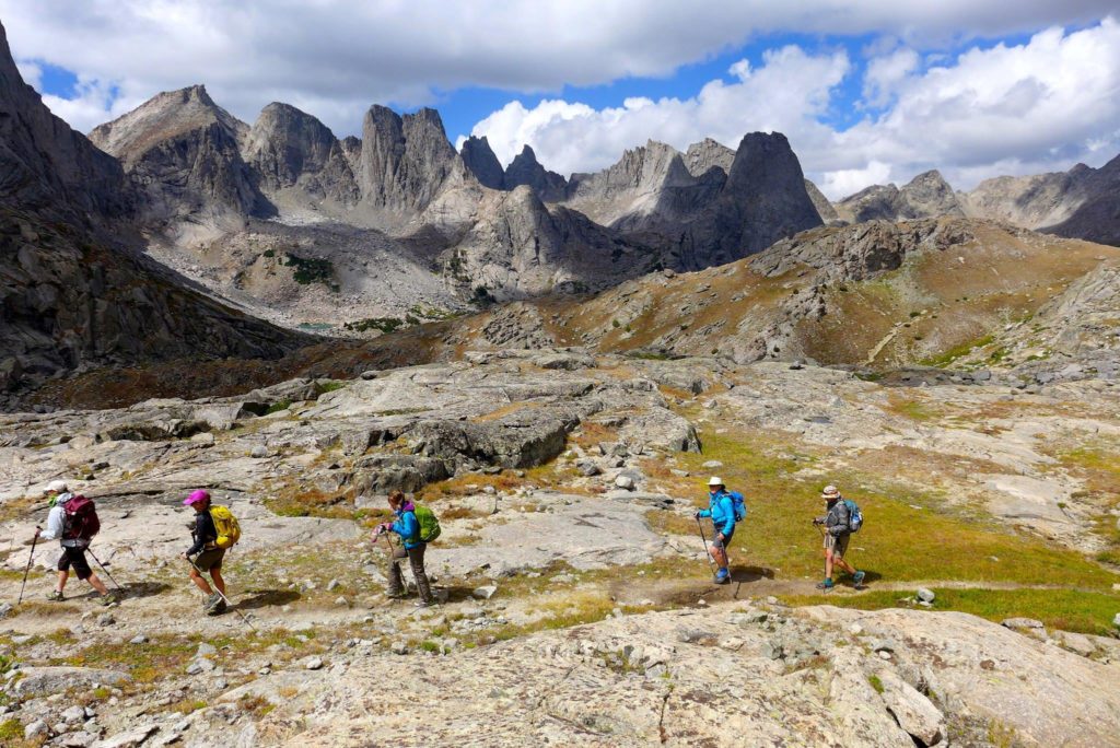 Leading some friends on a training hike over Jackass Pass, with Cirque of the Towers in the background.